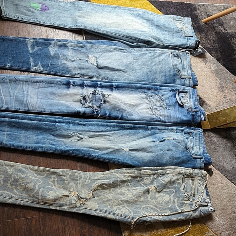 5 pair of name brand, never worn jeans